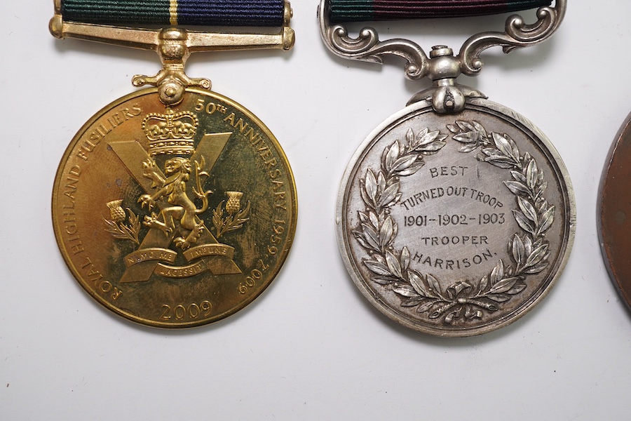 Four assorted medals; Royal East Kent Mounted Rifles Best Turned Out Troop 1901-1902-1903 Trooper Harrison; Medal for the Defence of Ookiep (reproduction); Honorable Artillery Company of London's Old Gunners Club medal t